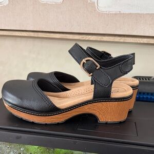 Clarks Black Leather Mules with Brown Sole